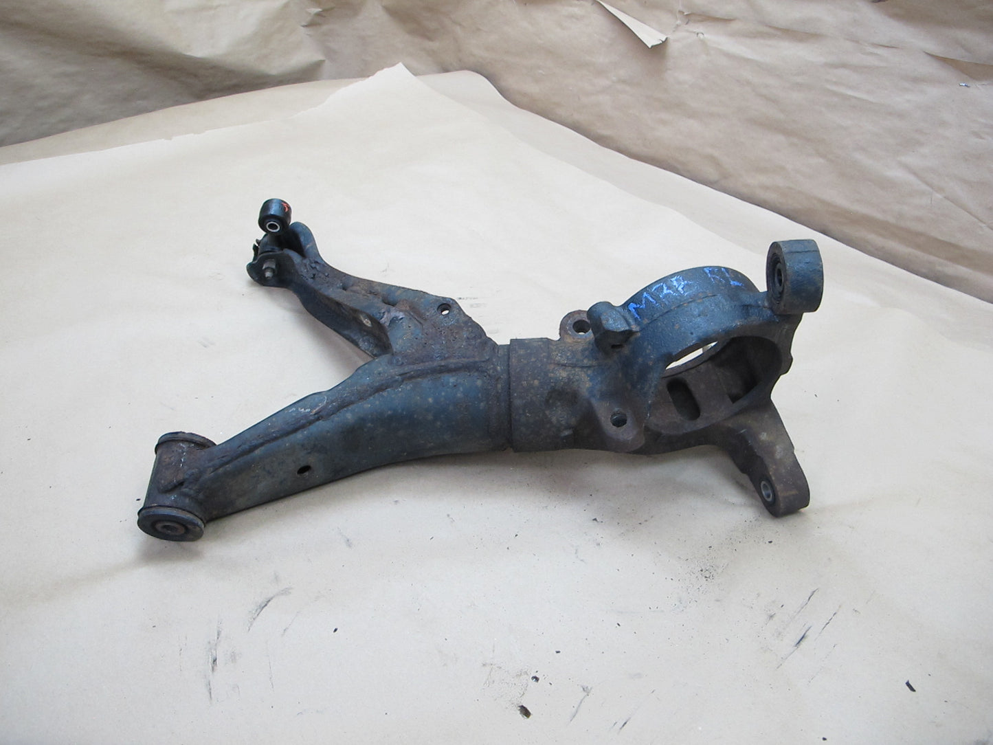 86-91 Mazda RX7 Rear Left Lower Control Arm OEM