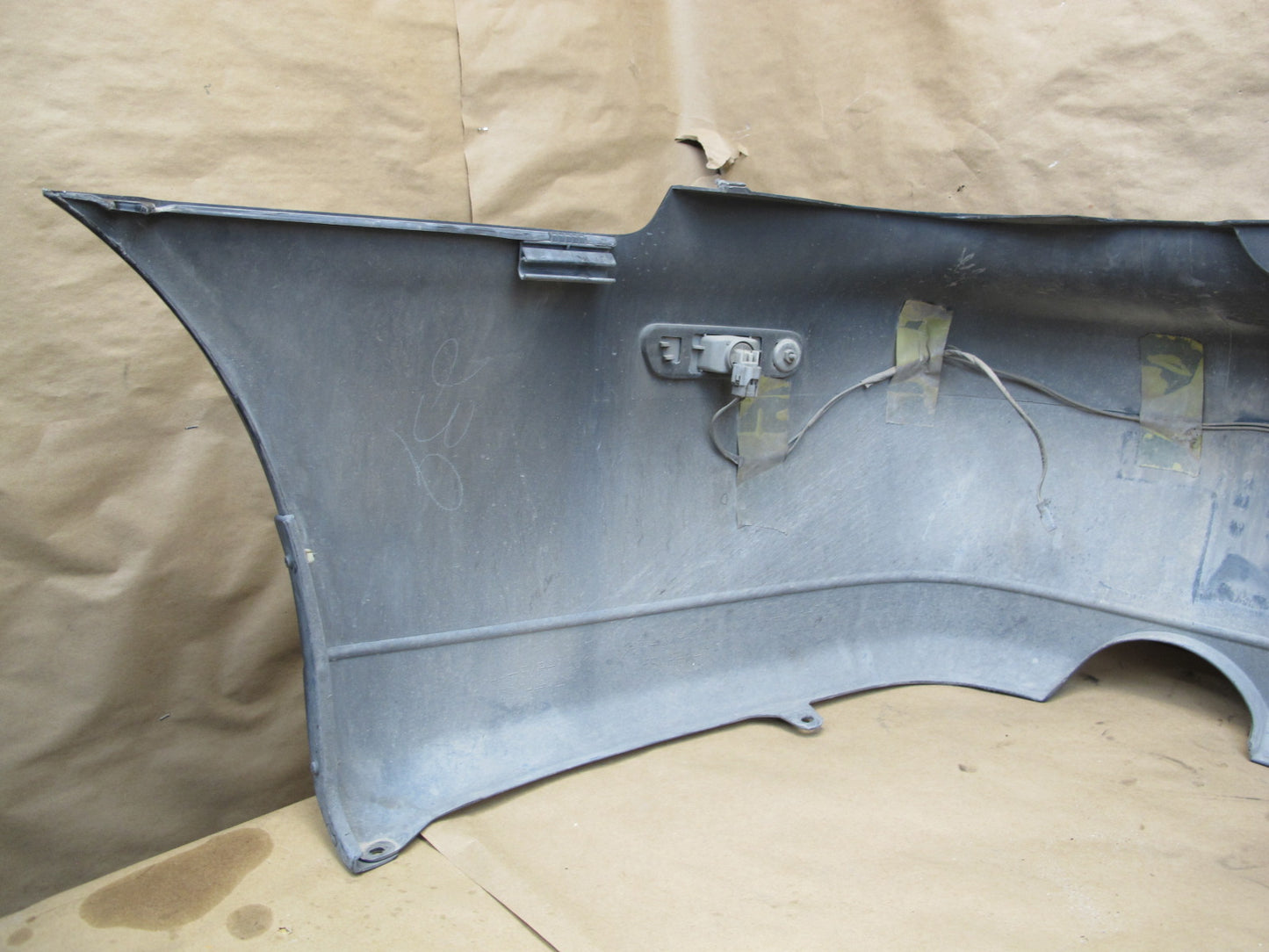 01-05 Lexus JCE10L IS300 Sedan Rear Bumper Cover w Marker Lights OEM