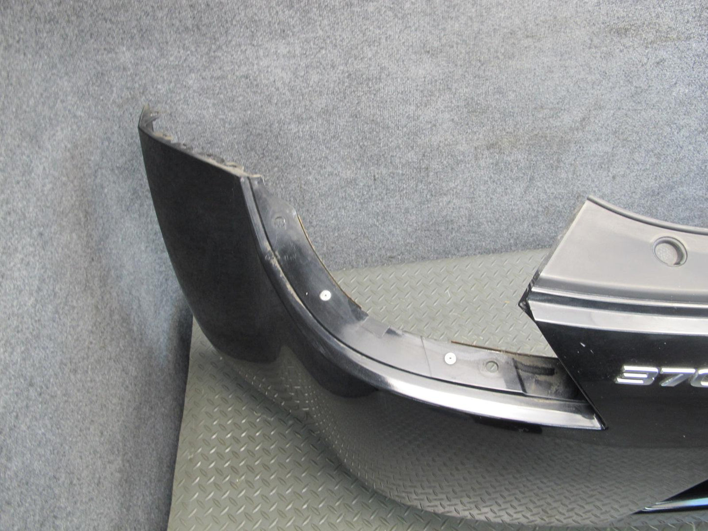 09-20 Nissan Z34 370Z Rear Bumper Cover Panel Black w Emblem OEM