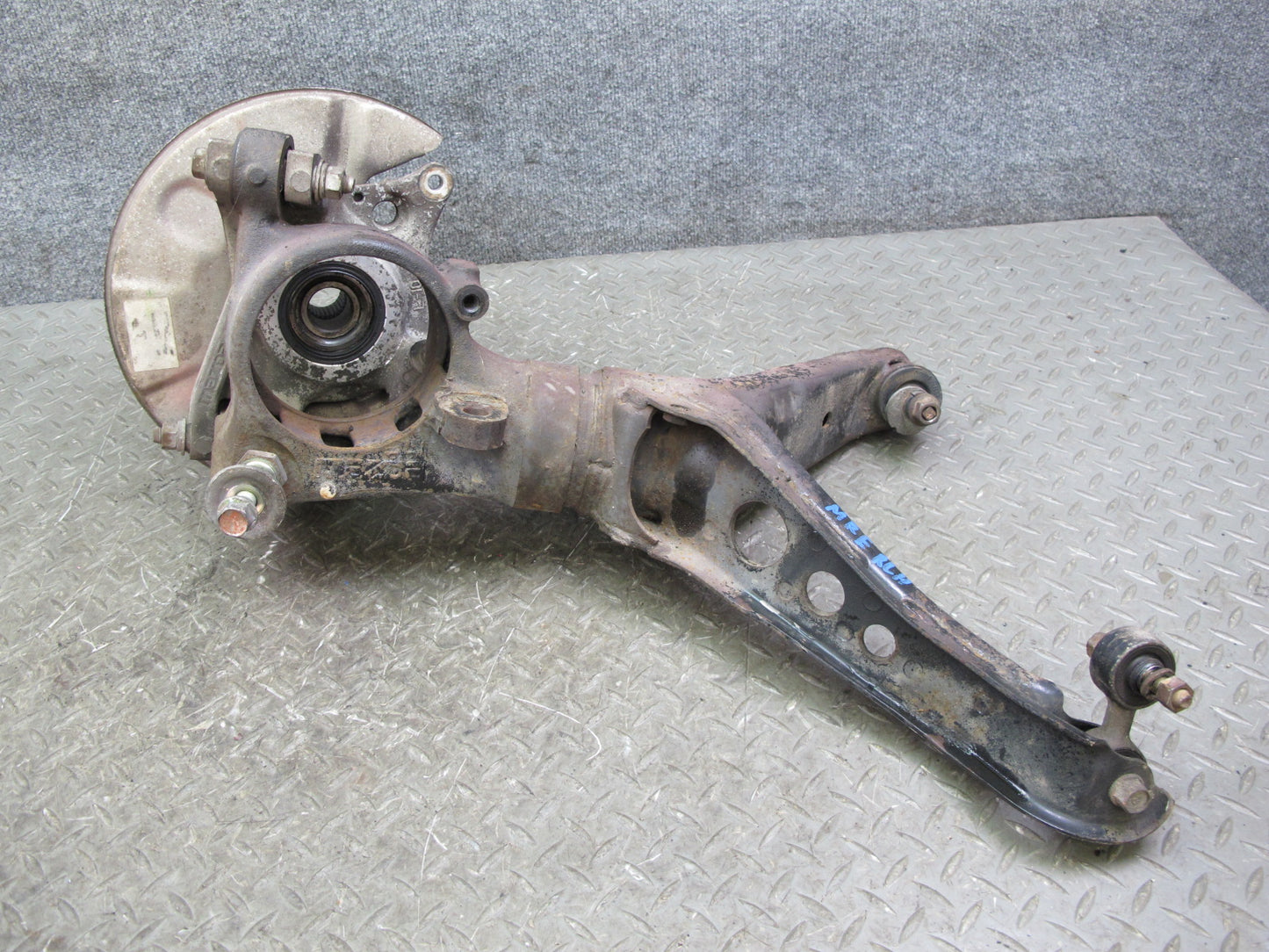 86-91 Mazda RX7 FC3S Rear Left Spindle Knuckle Wheel Hub w Trailing Arm Assy OEM