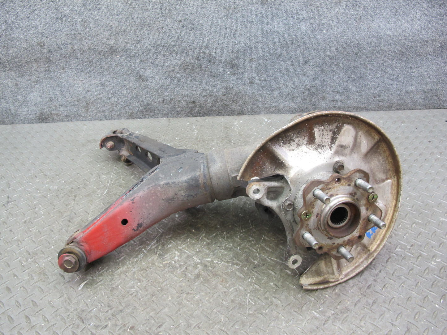 86-91 Mazda RX7 FC3S Rear Right Spindle Knuckle Wheel Hub w Trailing Arm OEM