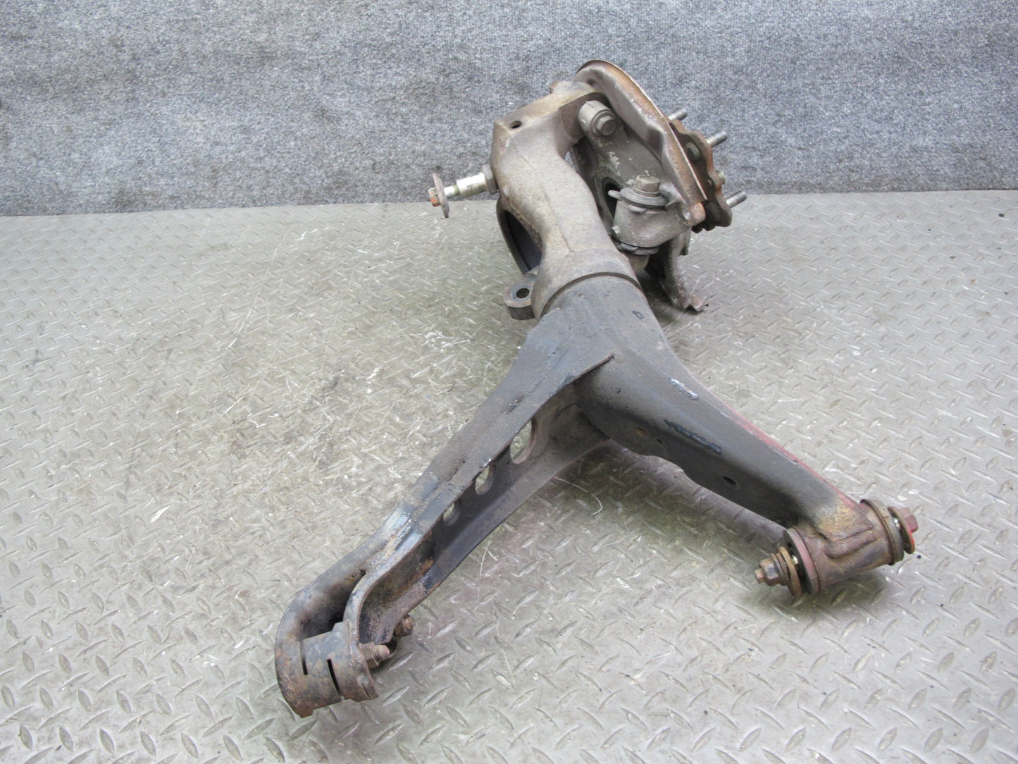 86-91 Mazda RX7 FC3S Rear Right Spindle Knuckle Wheel Hub w Trailing Arm OEM