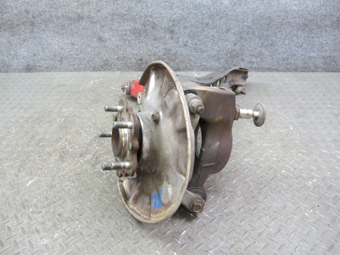 86-91 Mazda RX7 FC3S Rear Right Spindle Knuckle Wheel Hub w Trailing Arm OEM
