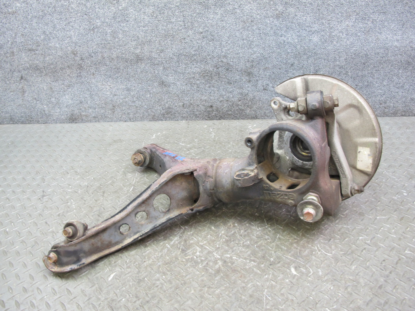 86-91 Mazda RX7 FC3S Rear Right Spindle Knuckle Wheel Hub w Trailing Arm OEM
