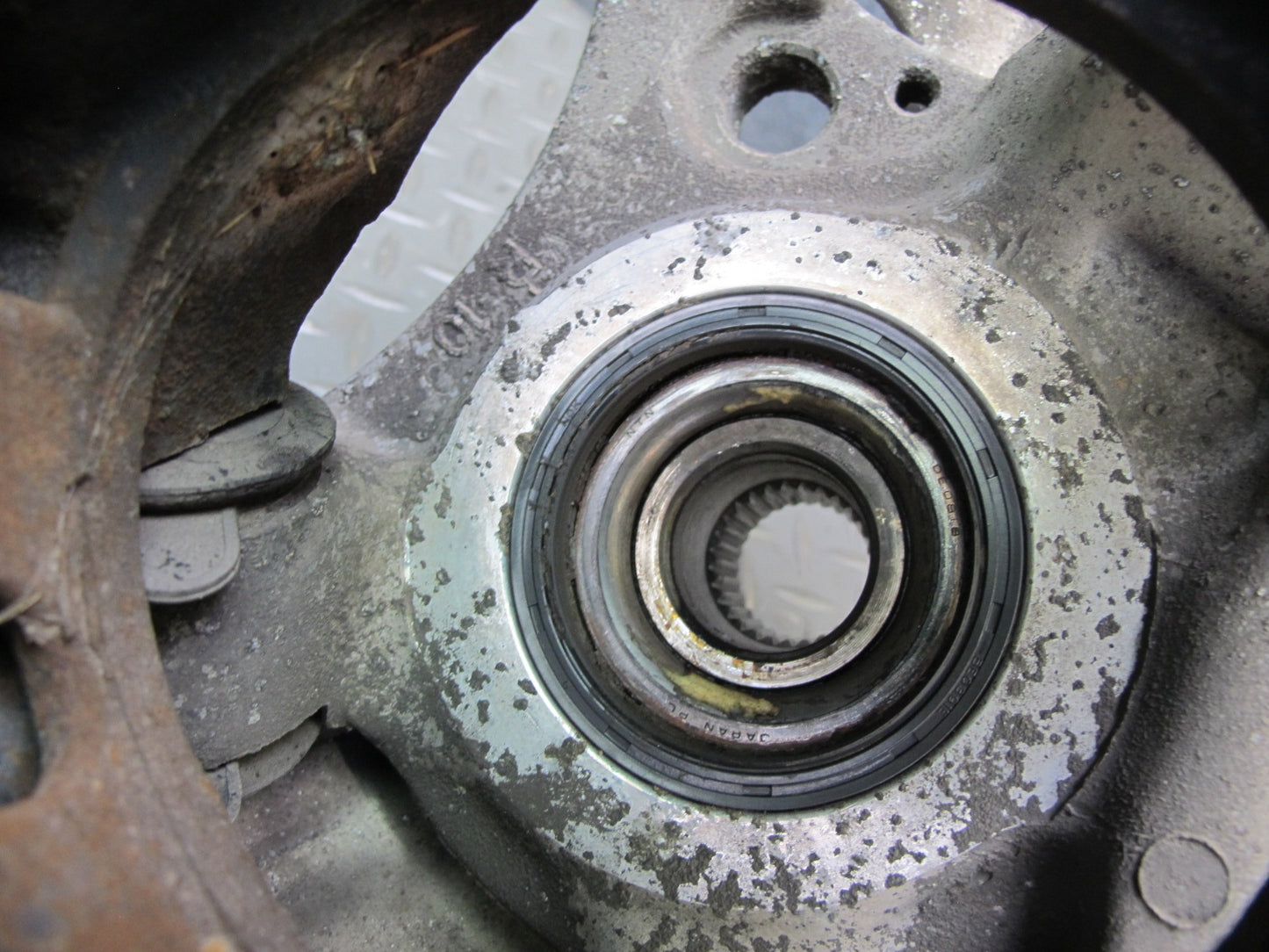 86-91 Mazda RX7 FC3S Rear Right Spindle Knuckle Wheel Hub w Trailing Arm OEM