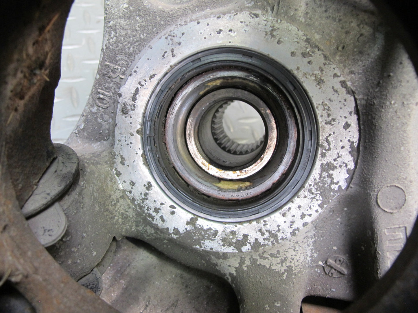 86-91 Mazda RX7 FC3S Rear Left Spindle Knuckle Wheel Hub w Trailing Arm Assy OEM