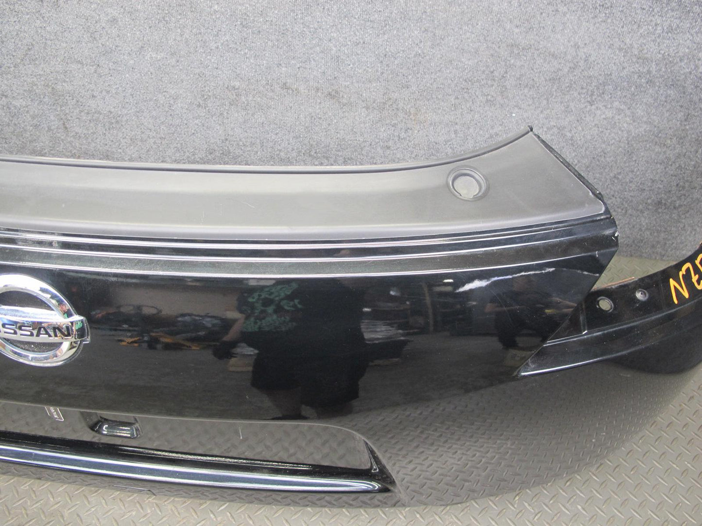 09-20 Nissan Z34 370Z Rear Bumper Cover Panel Black w Emblem OEM
