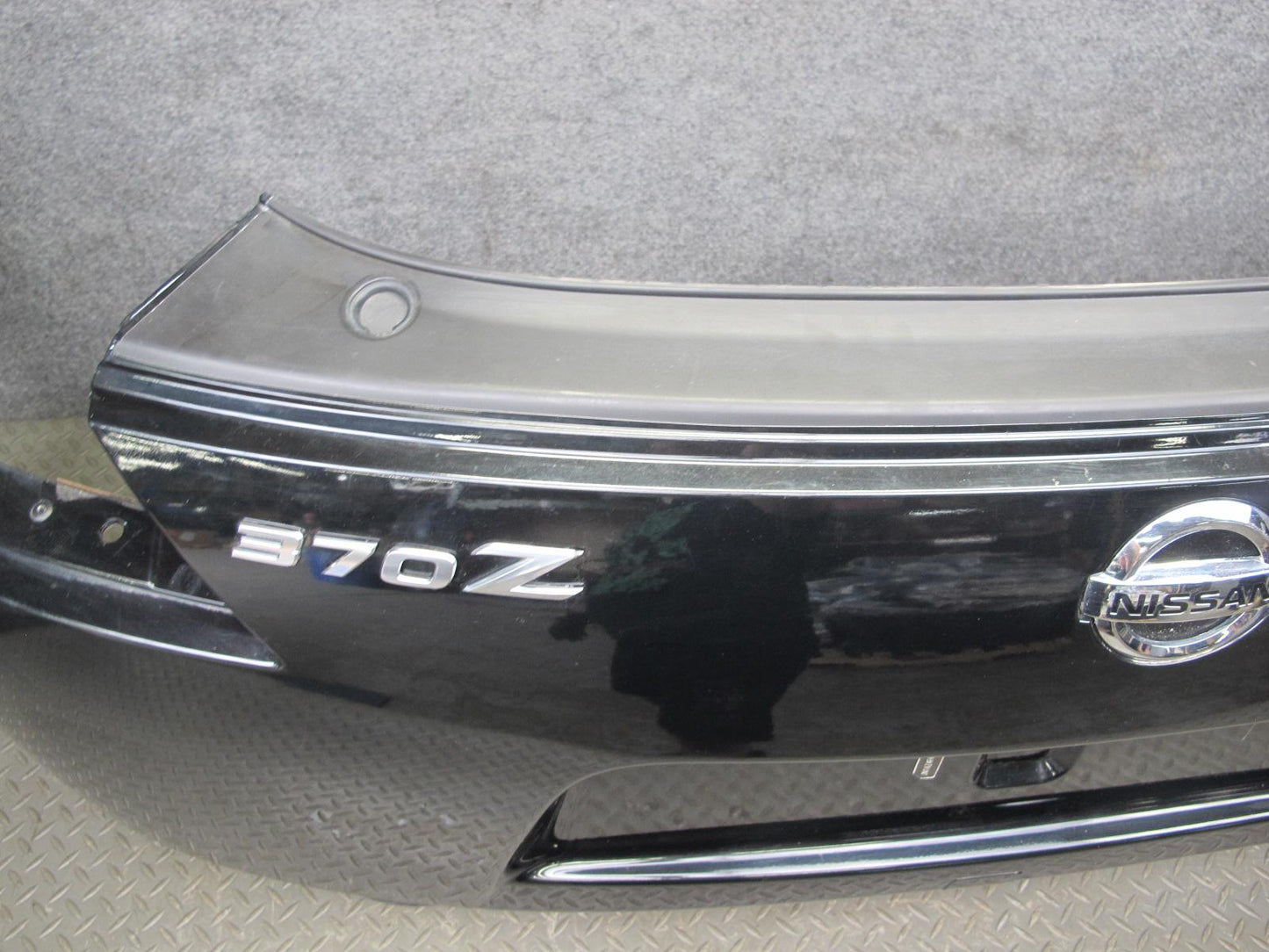09-20 Nissan Z34 370Z Rear Bumper Cover Panel Black w Emblem OEM