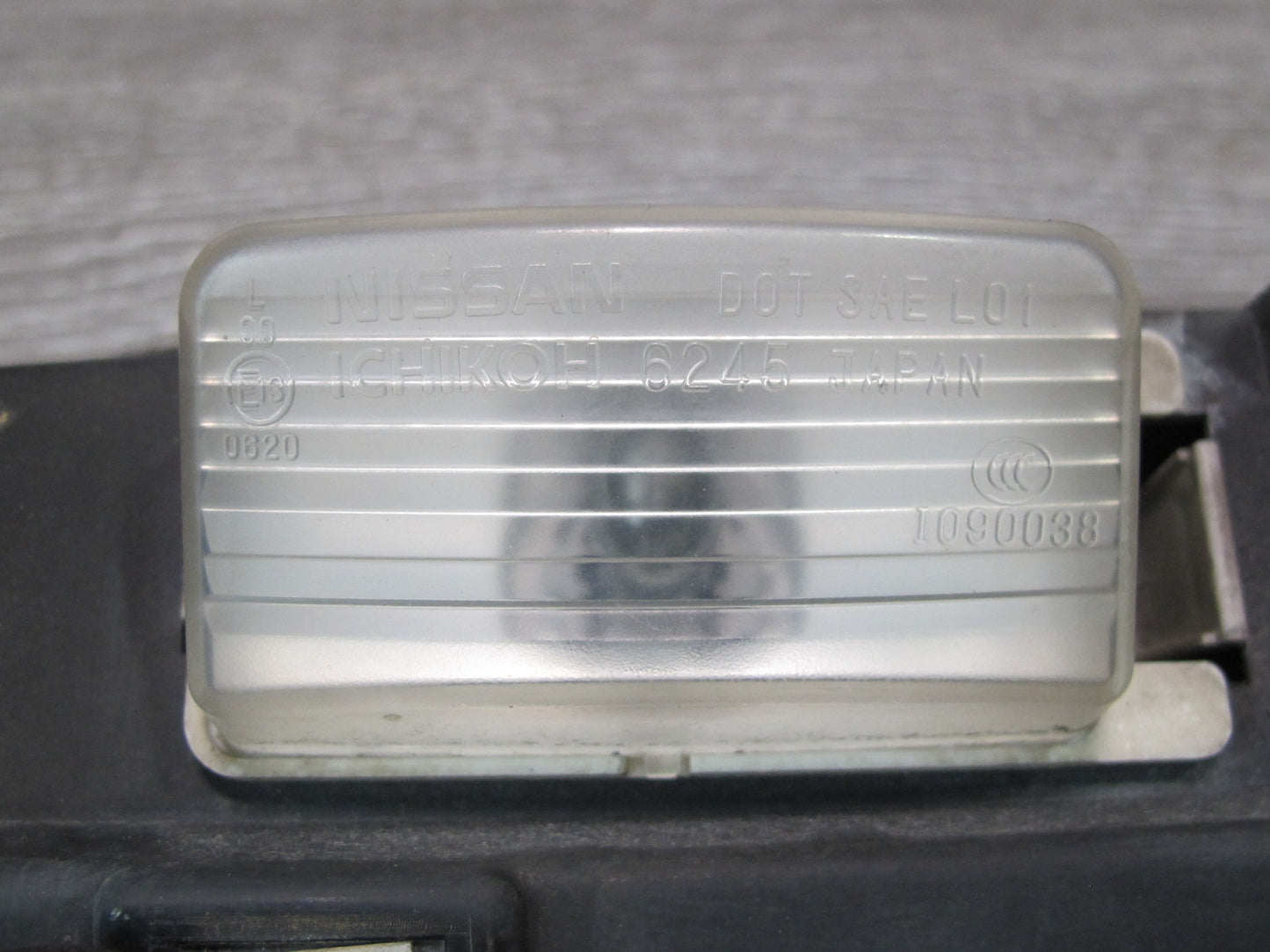 07-09 Nissan 350Z Z33 Rear Bumper License Plate Light Lamp Assembly OEM