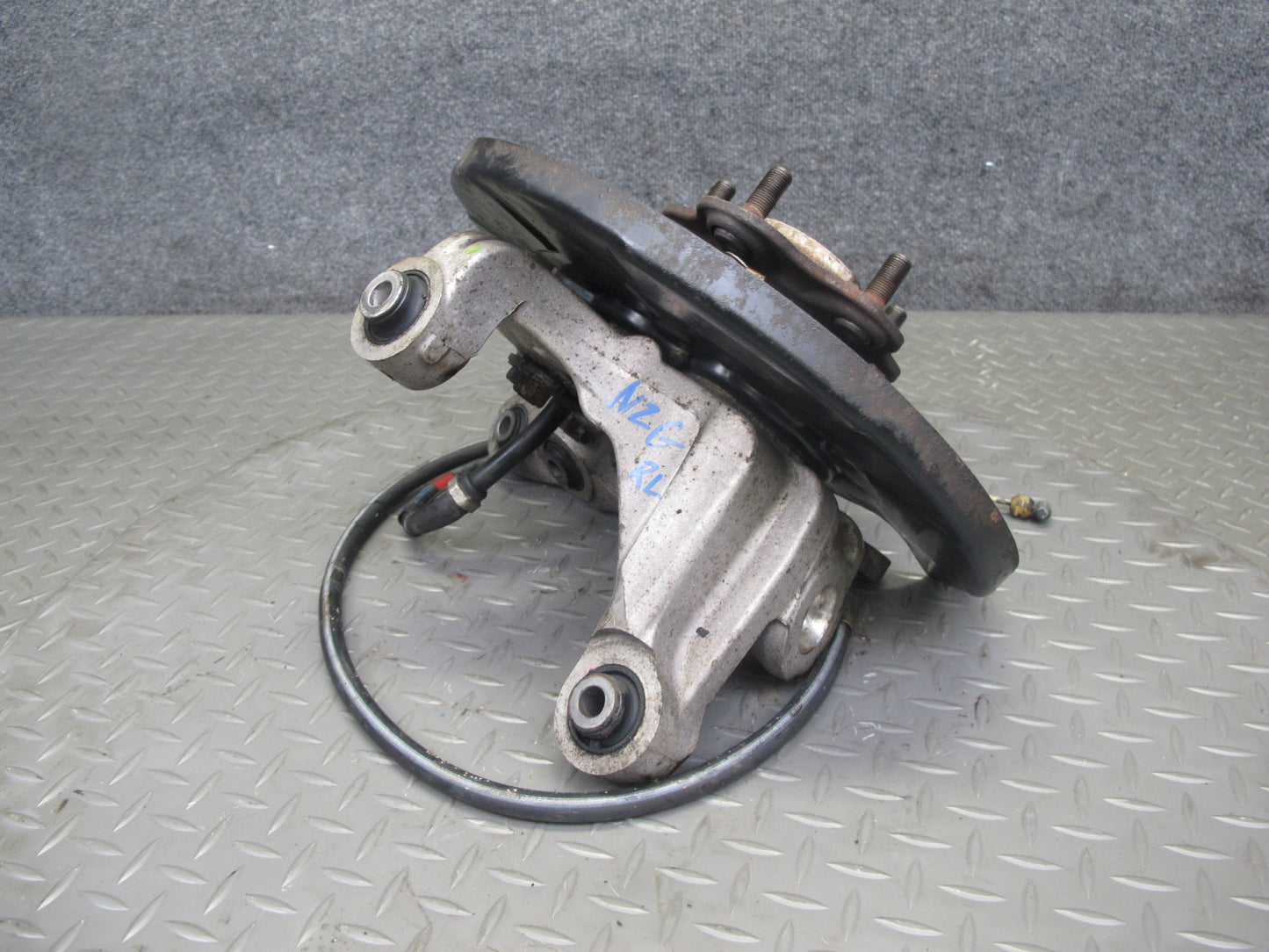 03-09 Nissan 350Z Z33 Rear Left Spindle Knuckle Wheel Hub Bearing OEM