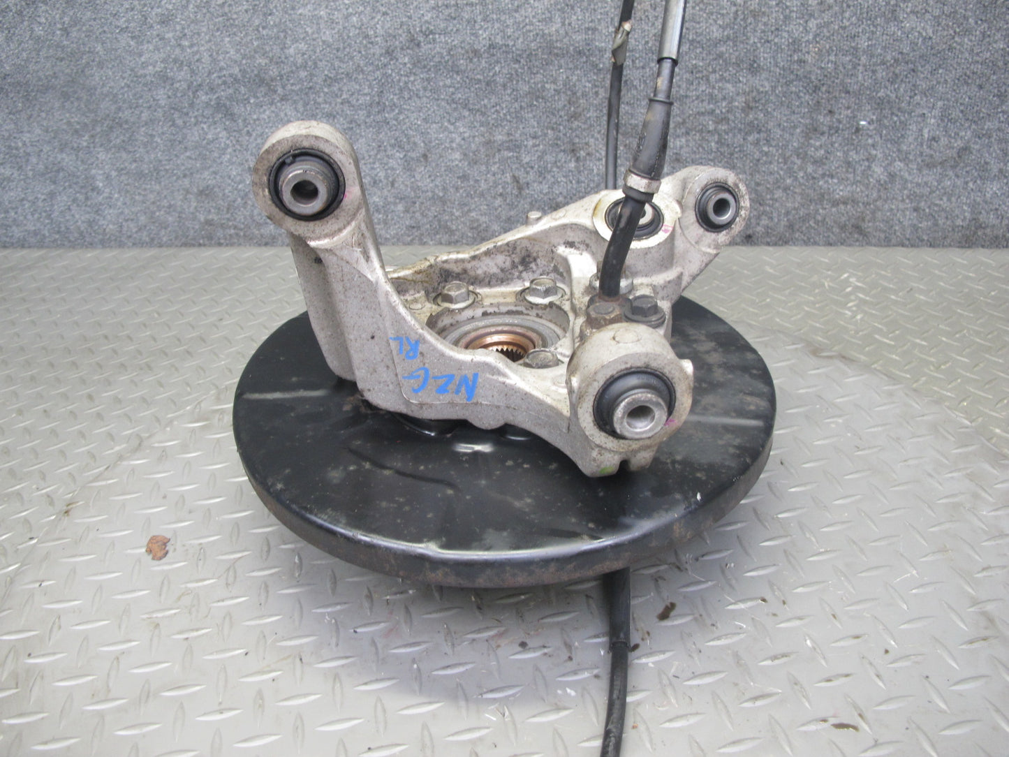03-09 Nissan 350Z Z33 Rear Left Spindle Knuckle Wheel Hub Bearing OEM