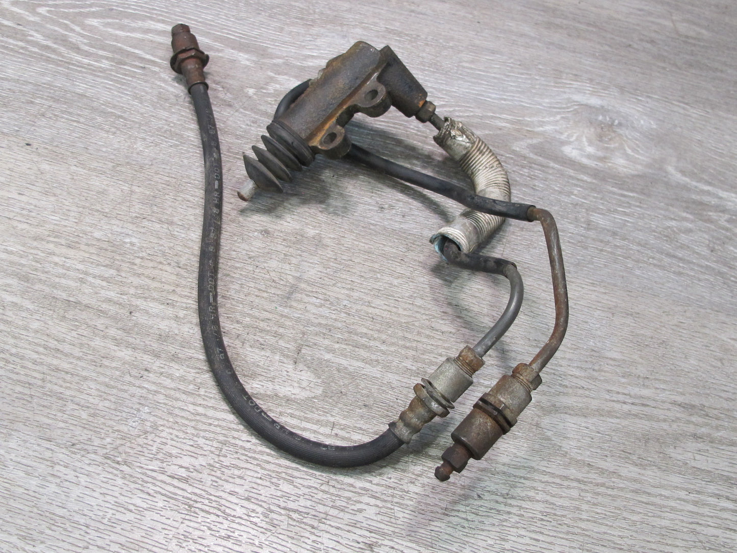 85-89 Toyota MR2 AW15 4AGELC M/T Clutch Slave Cylinder w Lines Assembly OEM