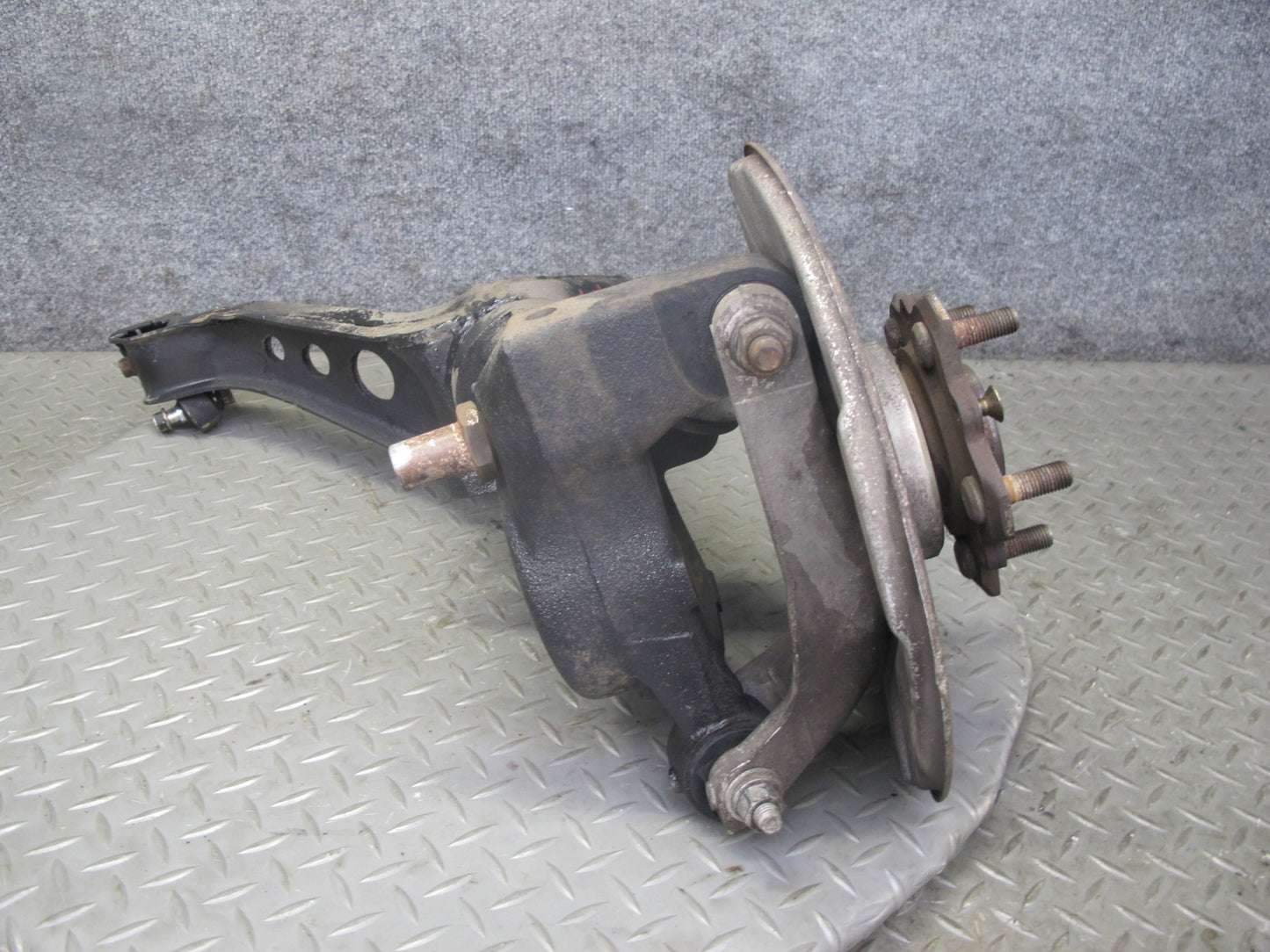86-91 Mazda RX7 FC3S Rear Left Spindle Knuckle Wheel Hub w Trailing Arm OEM