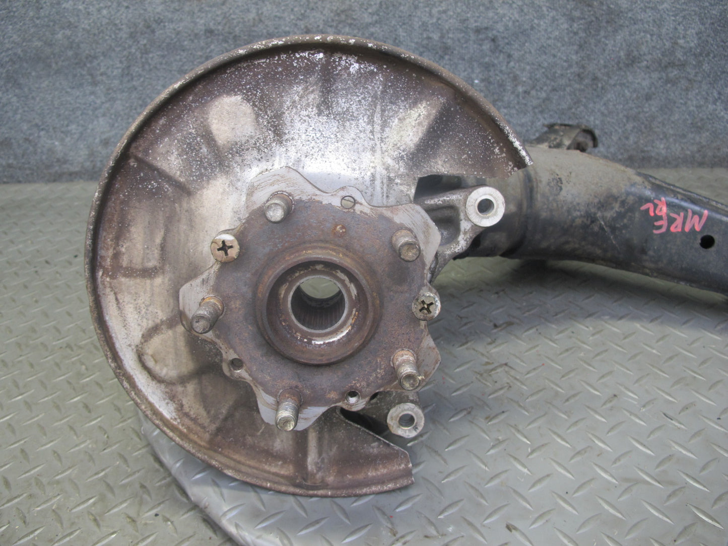 86-91 Mazda RX7 FC3S Rear Left Spindle Knuckle Wheel Hub w Trailing Arm OEM