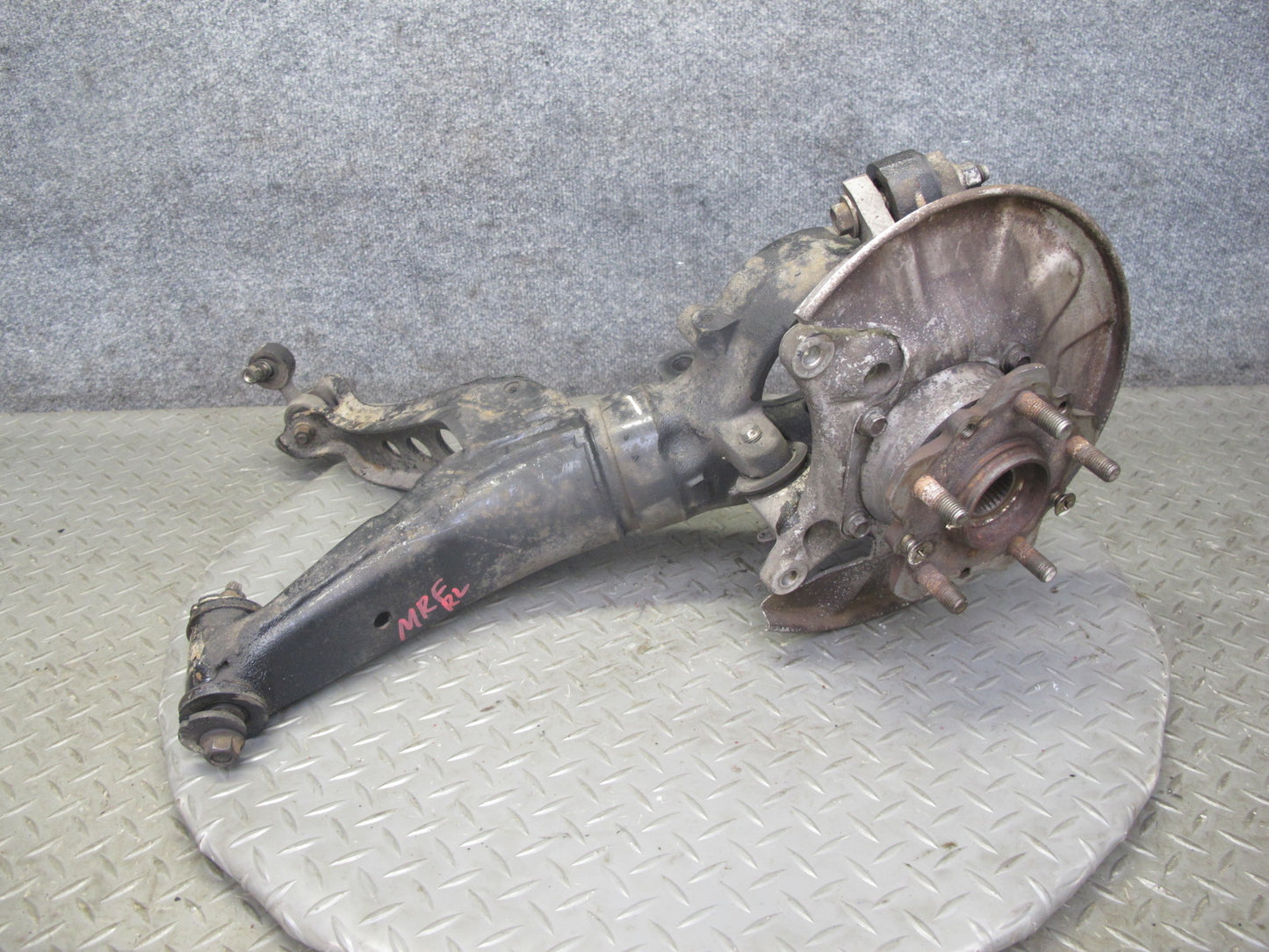 86-91 Mazda RX7 FC3S Rear Left Spindle Knuckle Wheel Hub w Trailing Arm OEM