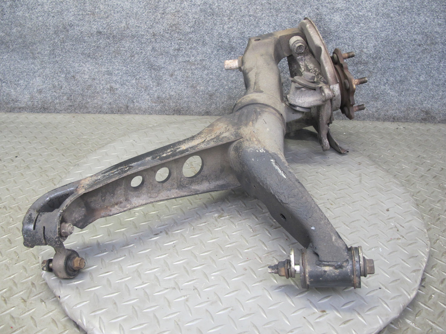 86-91 Mazda RX7 FC3S Rear Right Spindle Knuckle Wheel Hub w Trailing Arm OEM