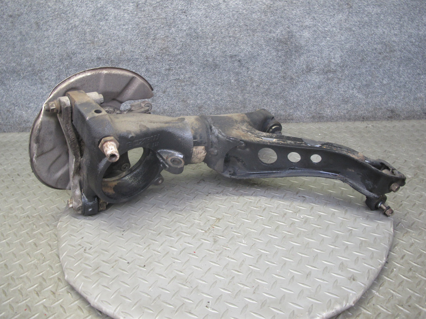 86-91 Mazda RX7 FC3S Rear Right Spindle Knuckle Wheel Hub w Trailing Arm OEM