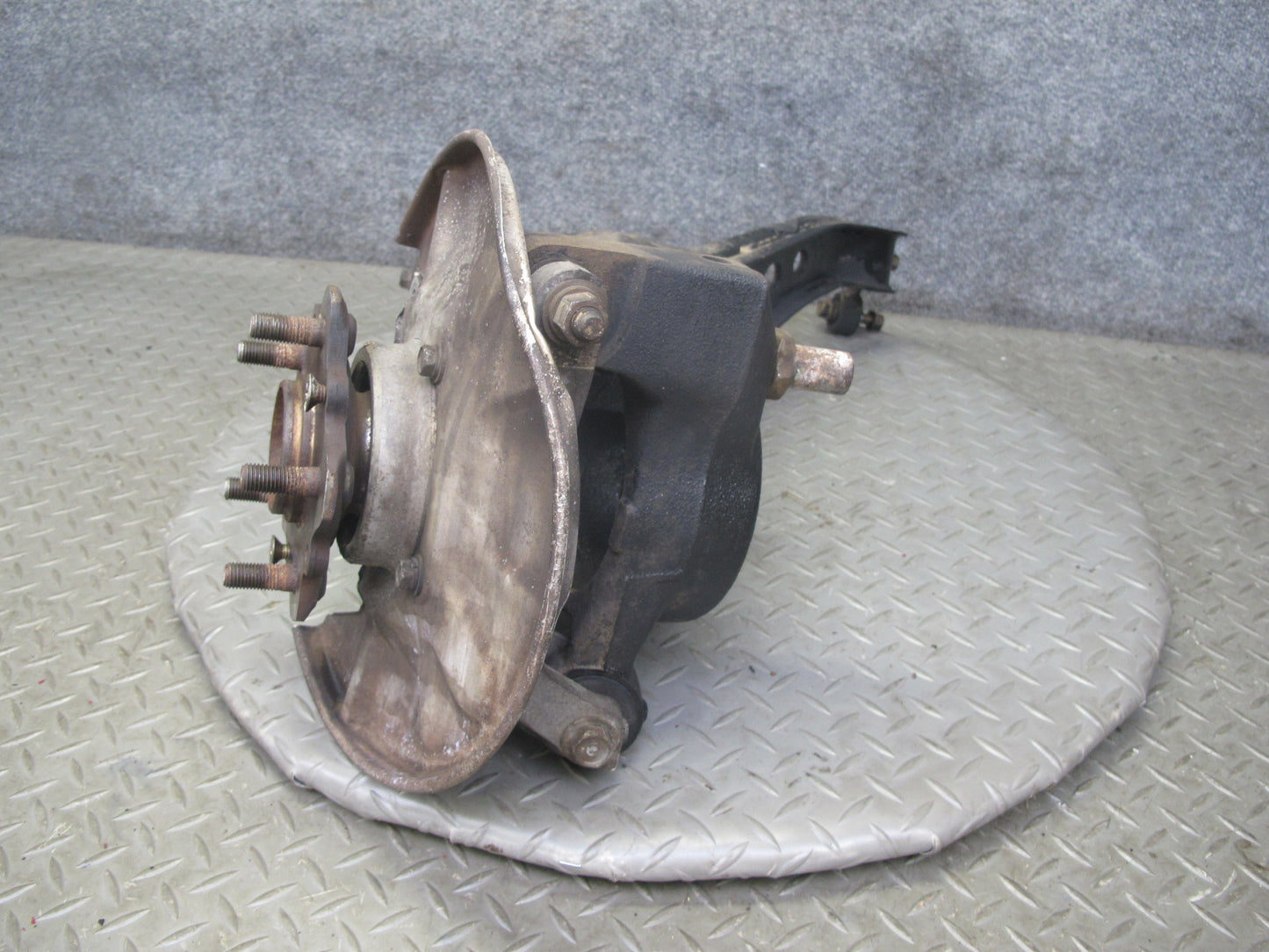 86-91 Mazda RX7 FC3S Rear Right Spindle Knuckle Wheel Hub w Trailing Arm OEM