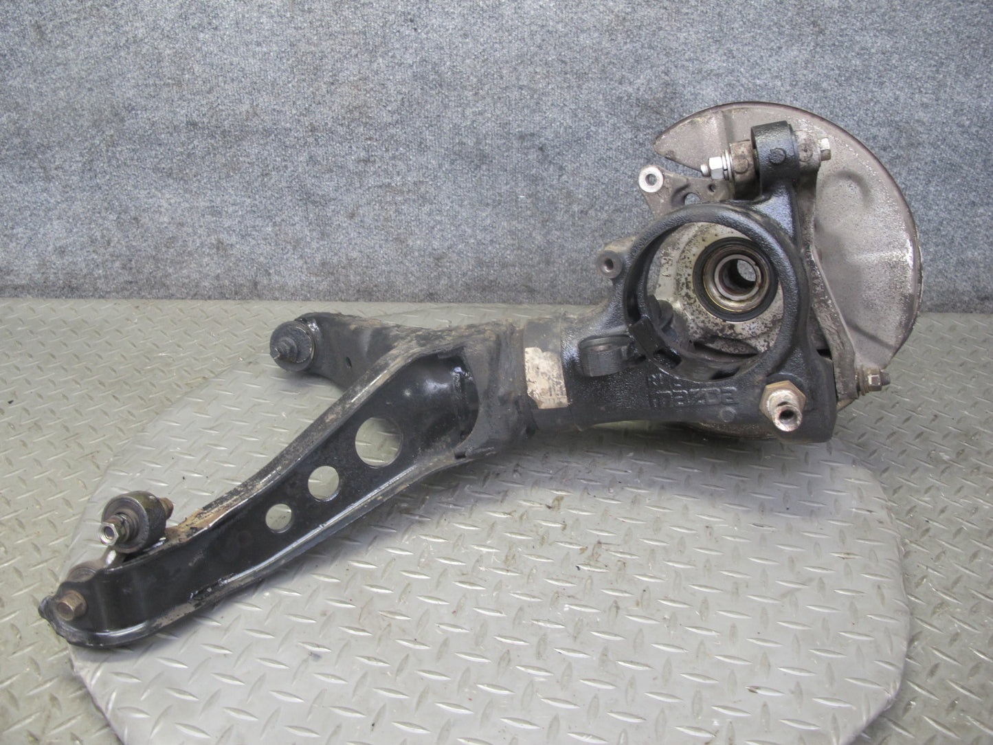 86-91 Mazda RX7 FC3S Rear Right Spindle Knuckle Wheel Hub w Trailing Arm OEM