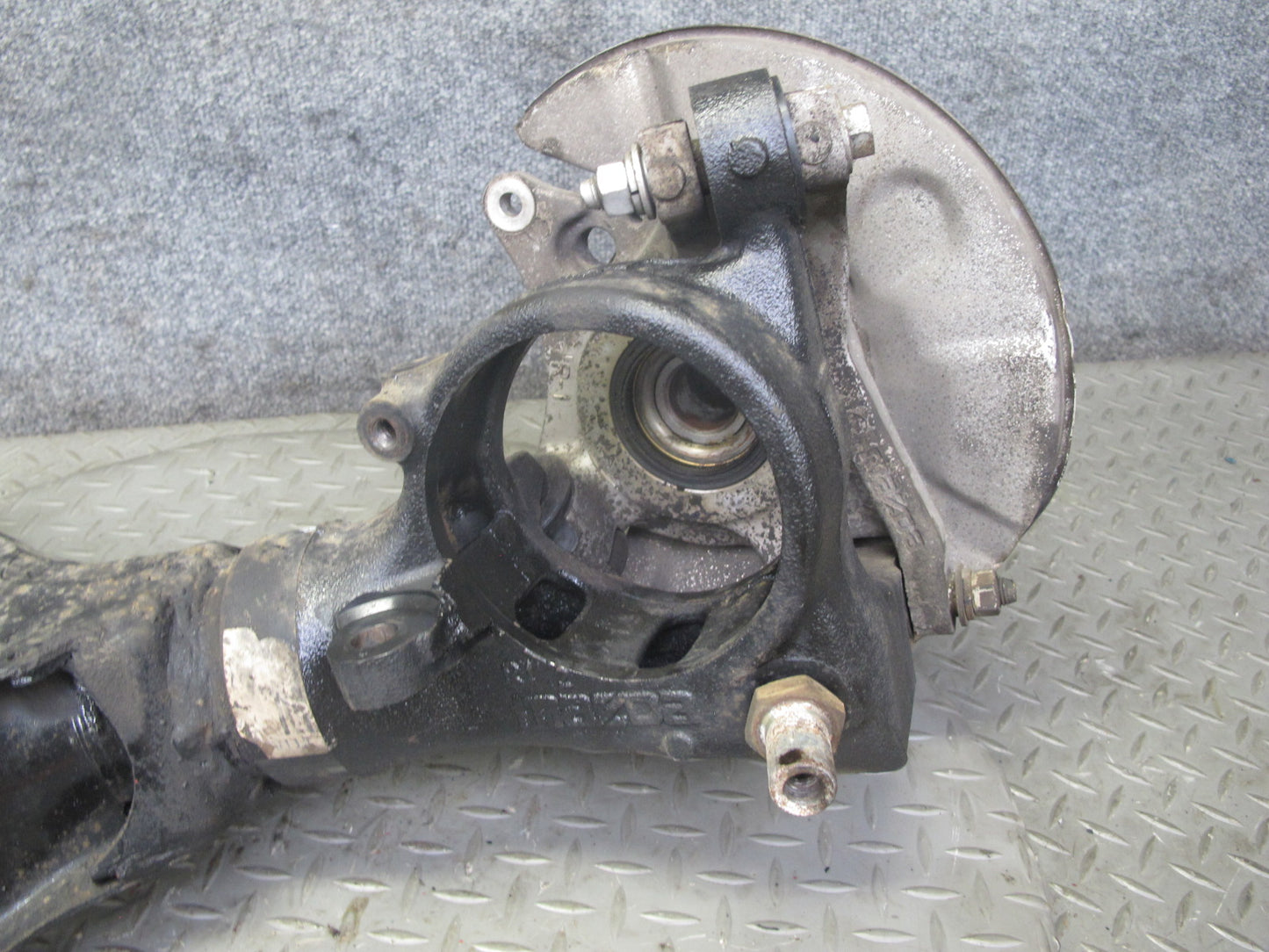 86-91 Mazda RX7 FC3S Rear Right Spindle Knuckle Wheel Hub w Trailing Arm OEM