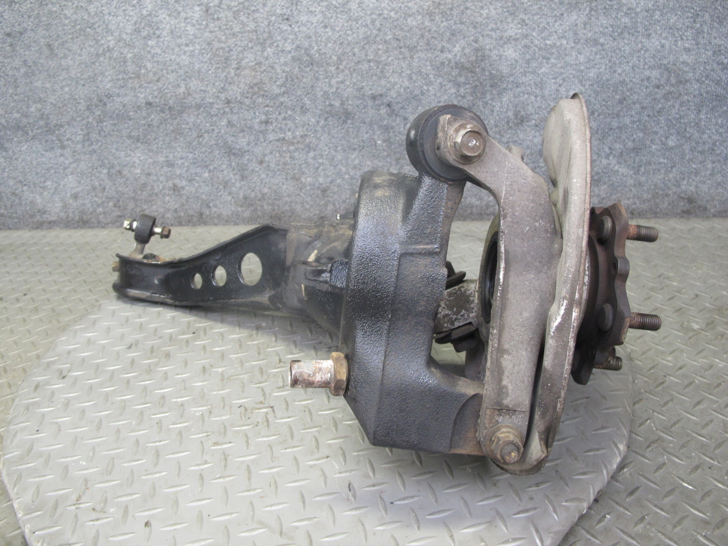 86-91 Mazda RX7 FC3S Rear Right Spindle Knuckle Wheel Hub w Trailing Arm OEM