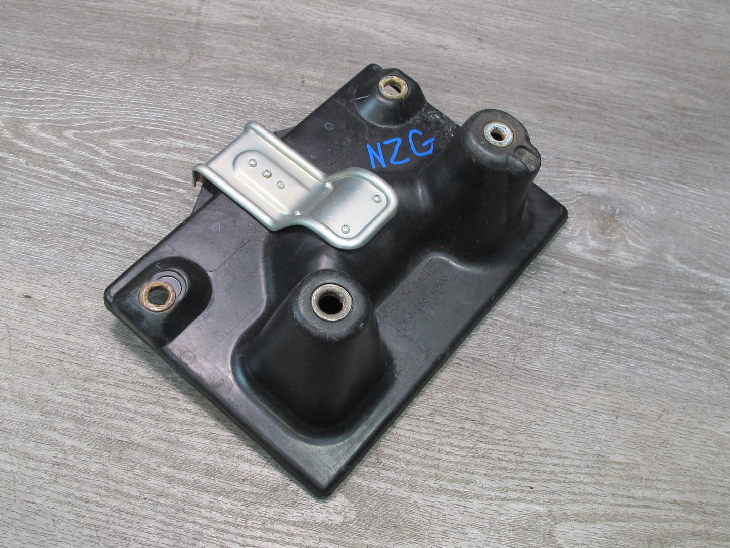 03-09 Nissan 350Z Z33 Battery Tray Holder 64866-AL500 OEM
