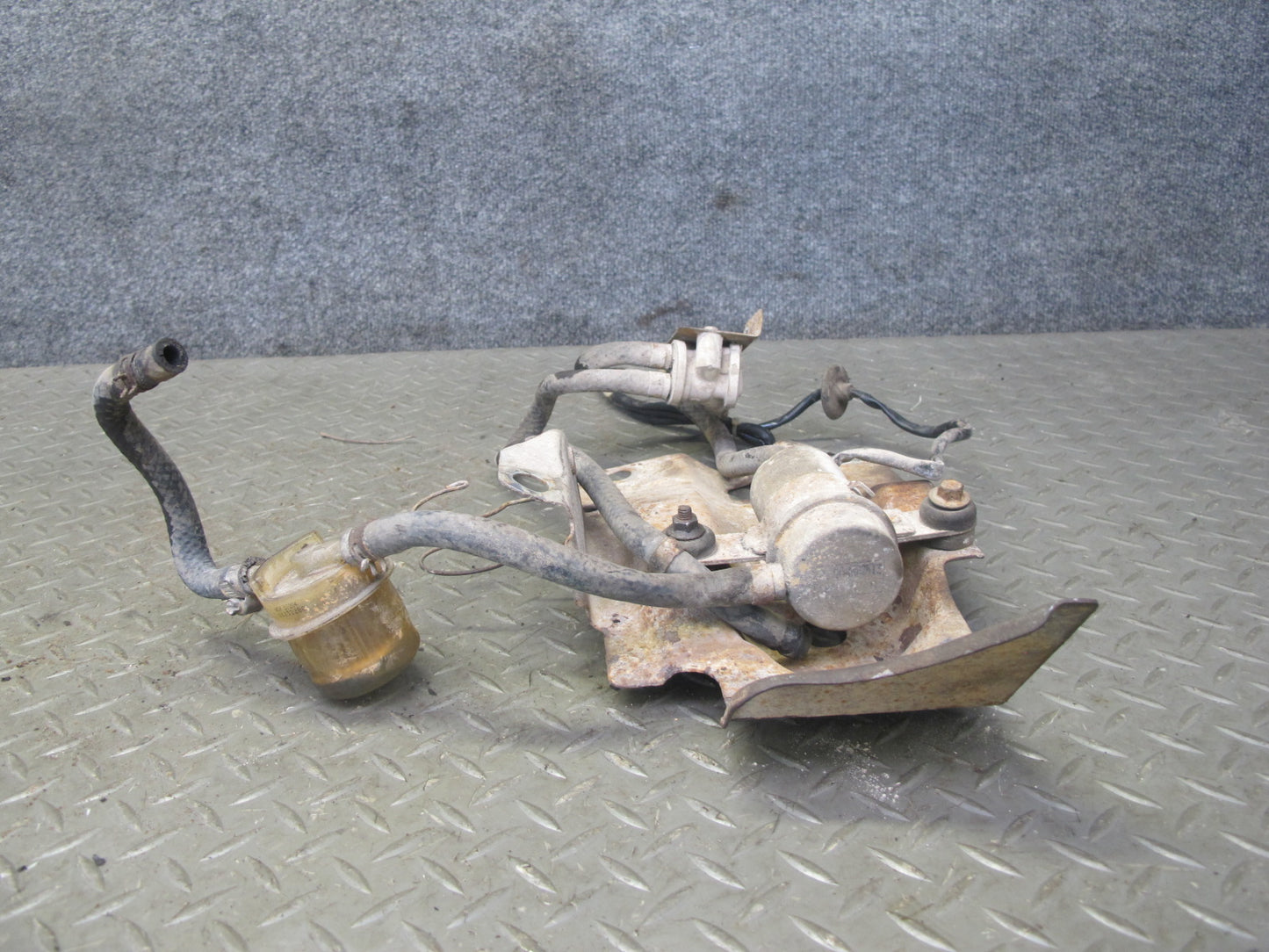 84-85 Mazda RX7 FB 12A Fuel Pump Filter Bracket Plate w Hose Assembly OEM