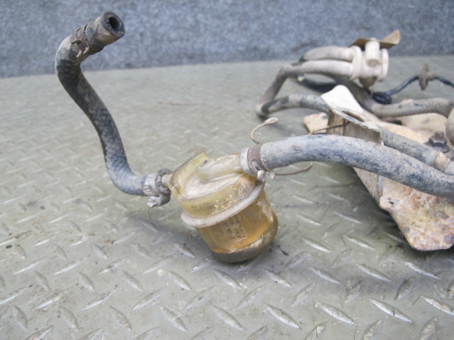 84-85 Mazda RX7 FB 12A Fuel Pump Filter Bracket Plate w Hose Assembly OEM