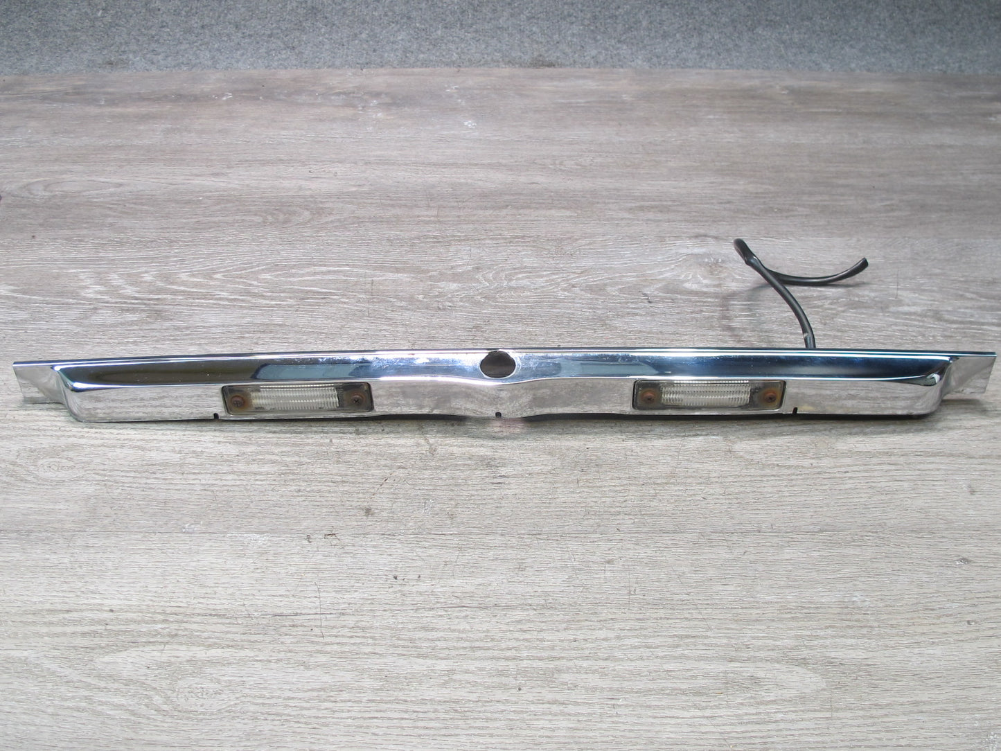 73-89 Mercedes R107 Rear Trunk Lid License Plate Light Lamp Chrome Molding OEM