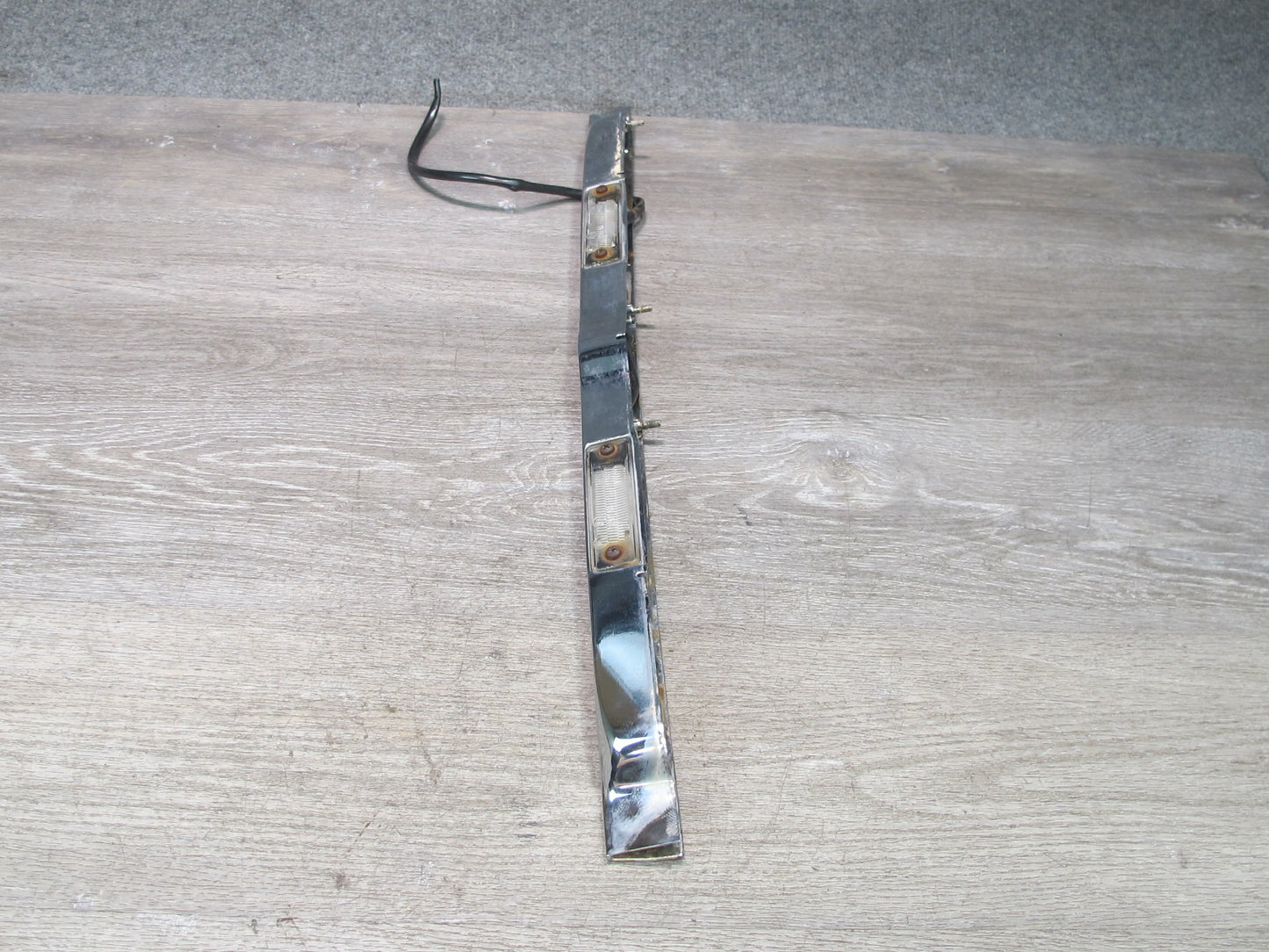 73-89 Mercedes R107 Rear Trunk Lid License Plate Light Lamp Chrome Molding OEM