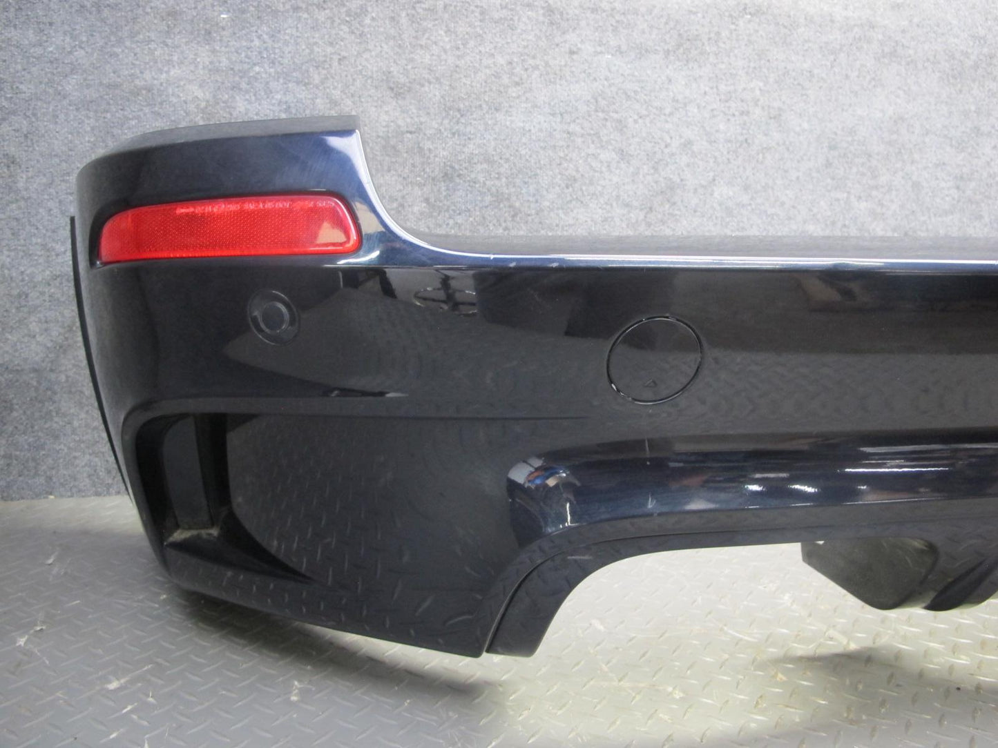 2010-2013 BMW E70 X5M Rear M-sport Bumper Cover w PDC Sensors