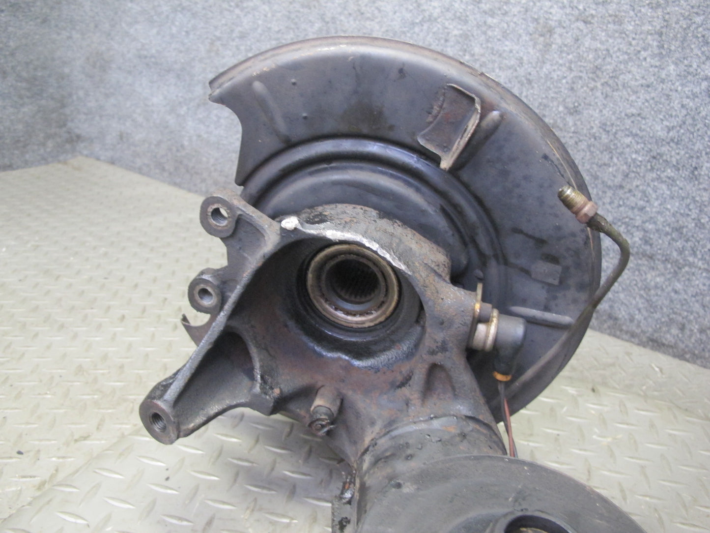 87-91 BMW E30 3-SERIES Rear Left Trailing Arm Spindle Knuckle Wheel Hub OEM