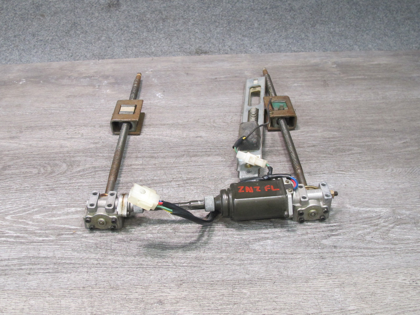 86-89 Nissan Z31 300ZX 2+0 Front Left Seat Adjust Motor Support Bracket OEM