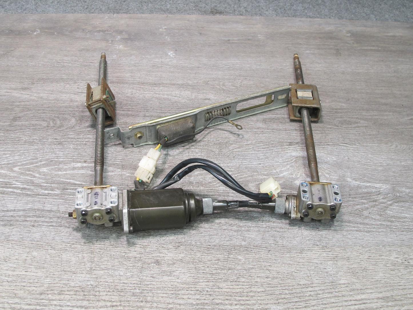 86-89 Nissan Z31 300ZX 2+0 Front Left Seat Adjust Motor Support Bracket OEM