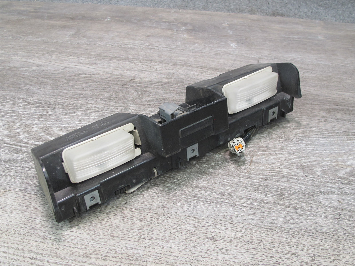 07-09 Nissan 350Z Z33 Rear Bumper License Plate Light Lamp Assembly OEM