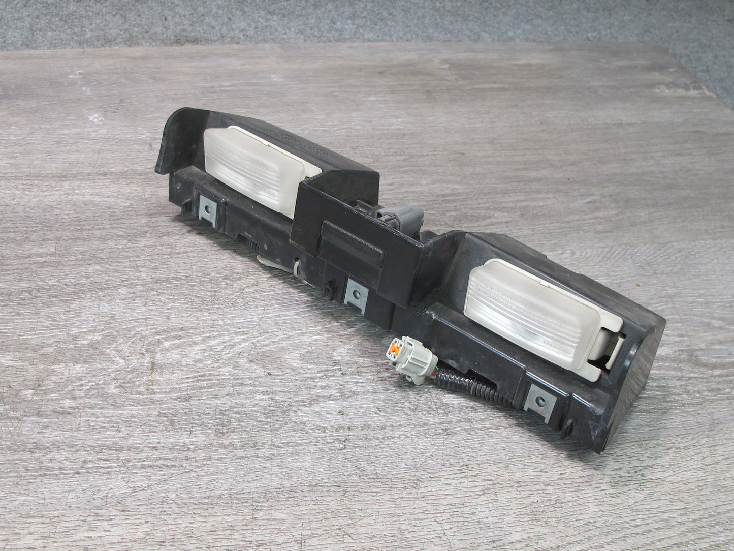 07-09 Nissan 350Z Z33 Rear Bumper License Plate Light Lamp Assembly OEM