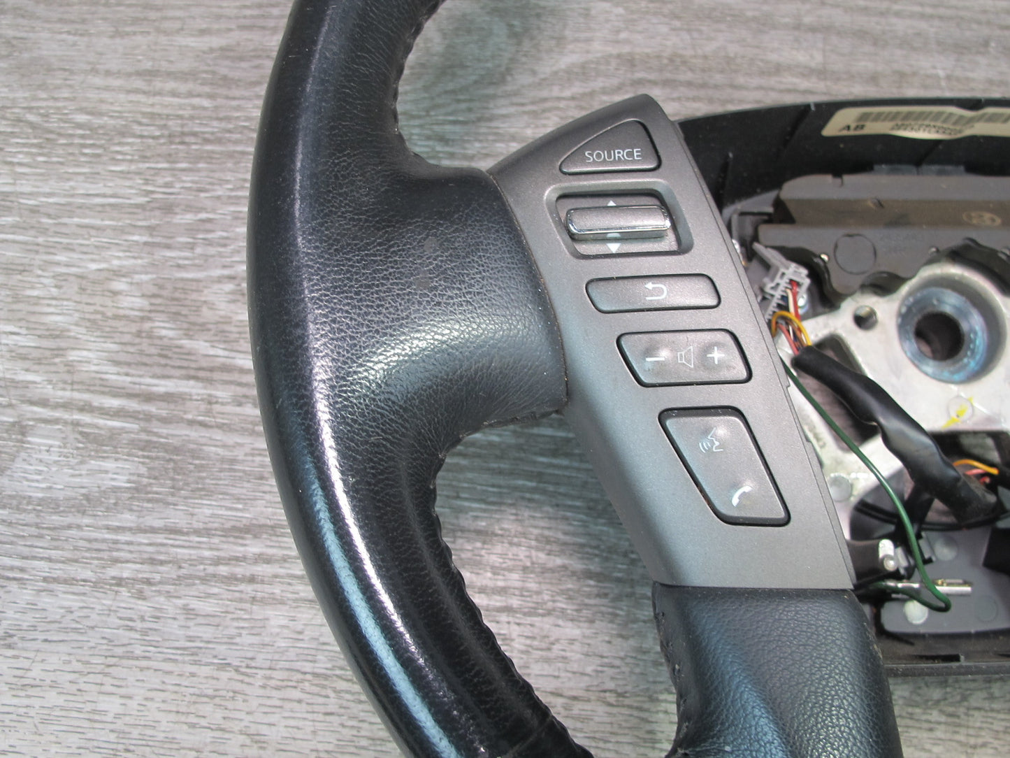 2011-2012 Infiniti QX56 Front Left Multifunction Heated Steering Leather Black