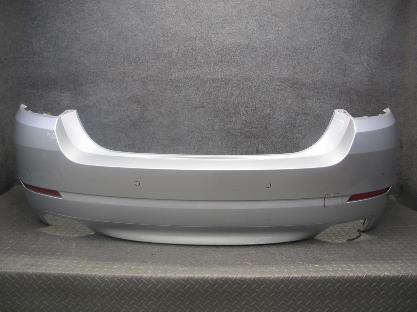 11-13 BMW F10 550i 550iX Rear Bumper Cover Titan Silver w PDC Sensors OEM