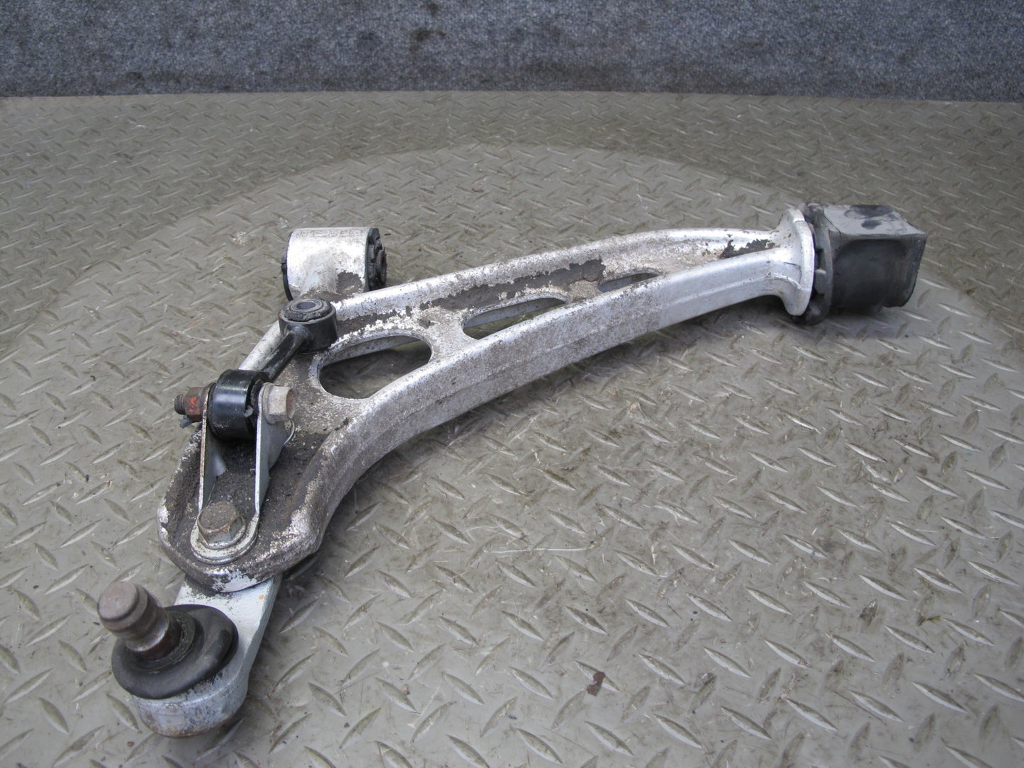 86-88 Mazda RX7 FC3S Front Left Suspension Lower Control Arm w Strut Rod OEM