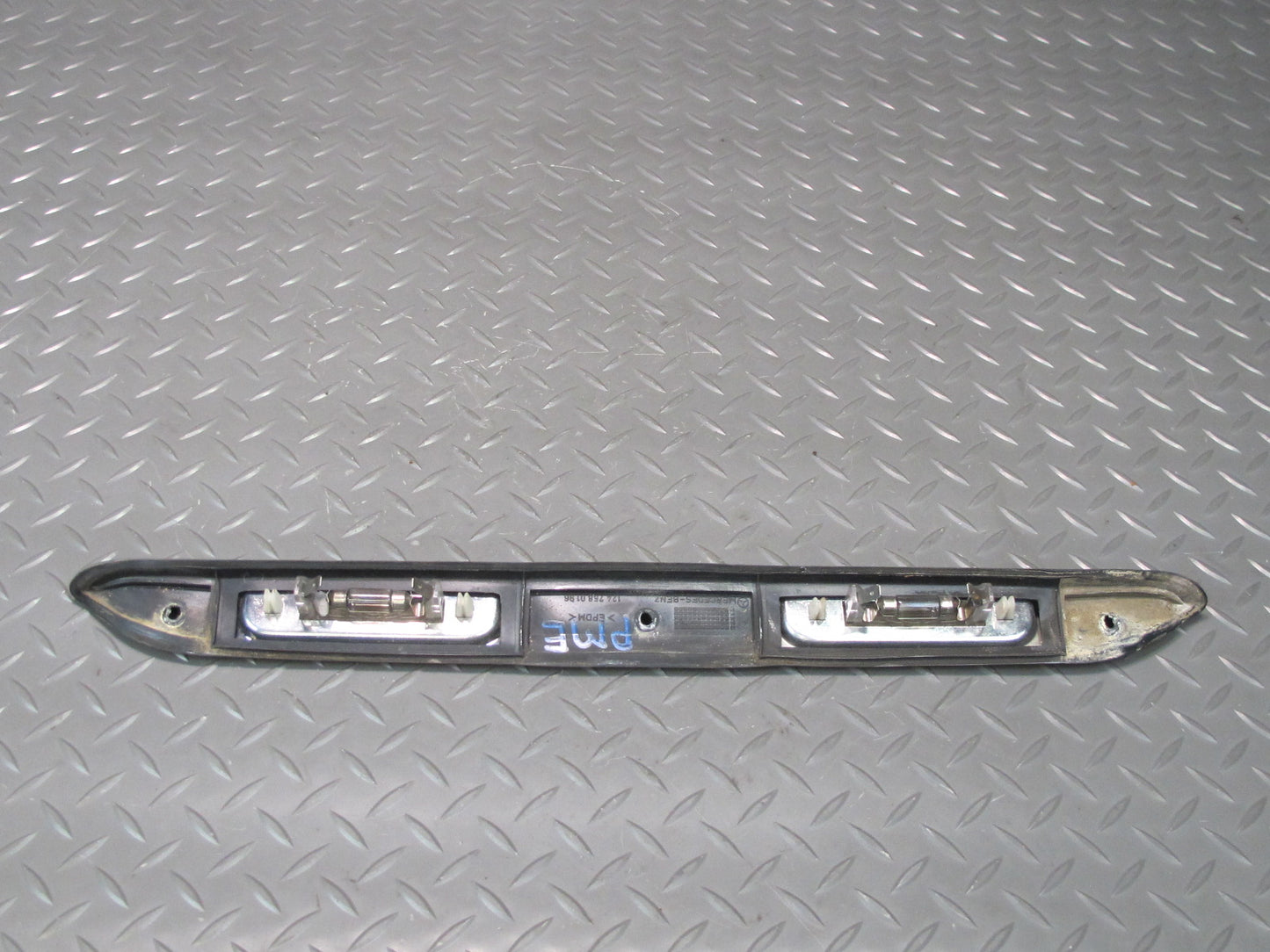 94-95 Mercedes W124 300D Sedan Rear Trunk Lid License Plate Trim Molding OEM