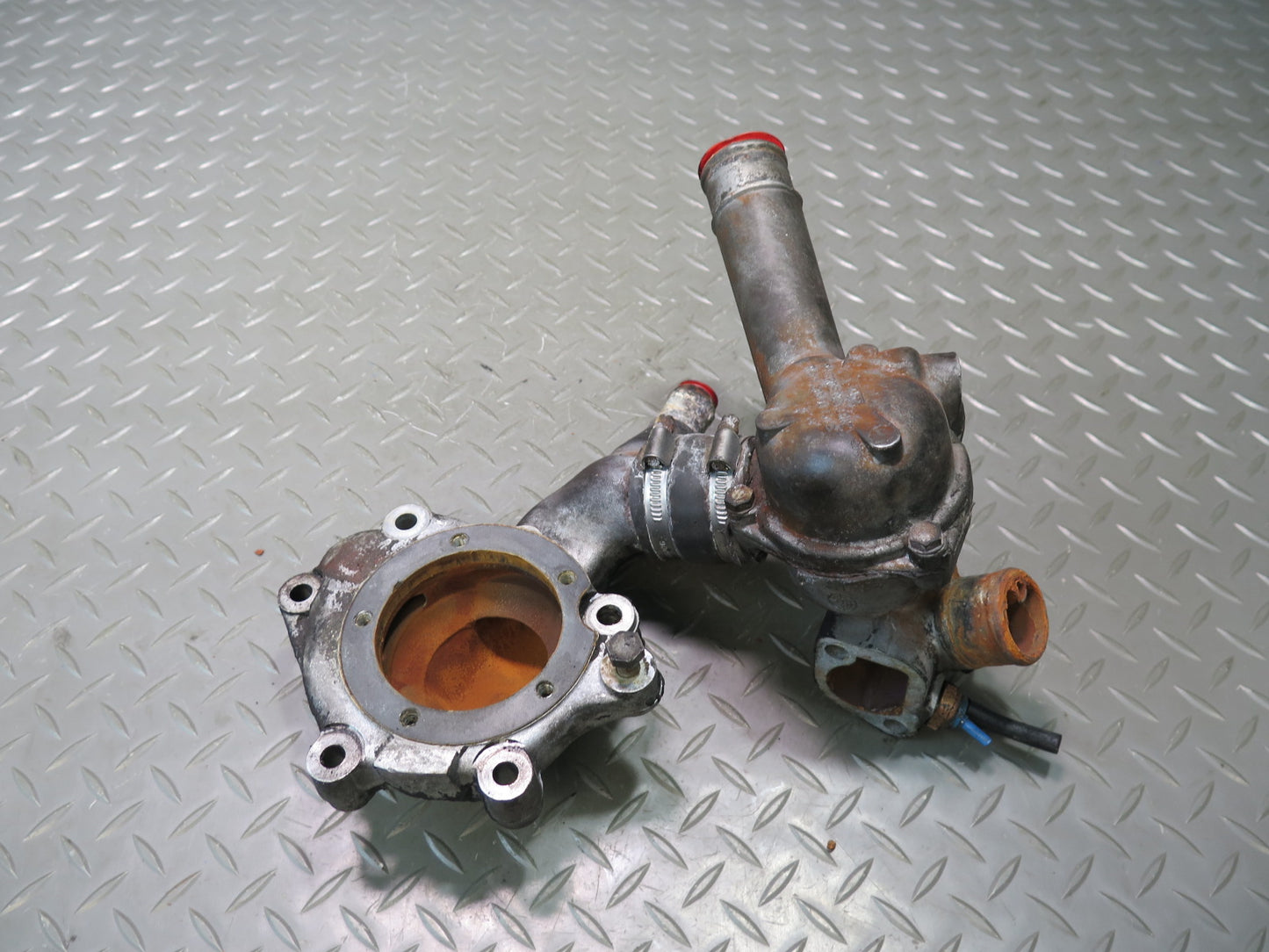 81-83 Mercedes W123 240D 616.912 Engine Thermostat & Water Pump Housing Assy OEM