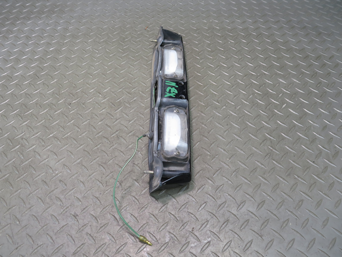 79-83 Datsun 280ZX S130 Rear License Plate Light TAG Trunk Trim Black OEM