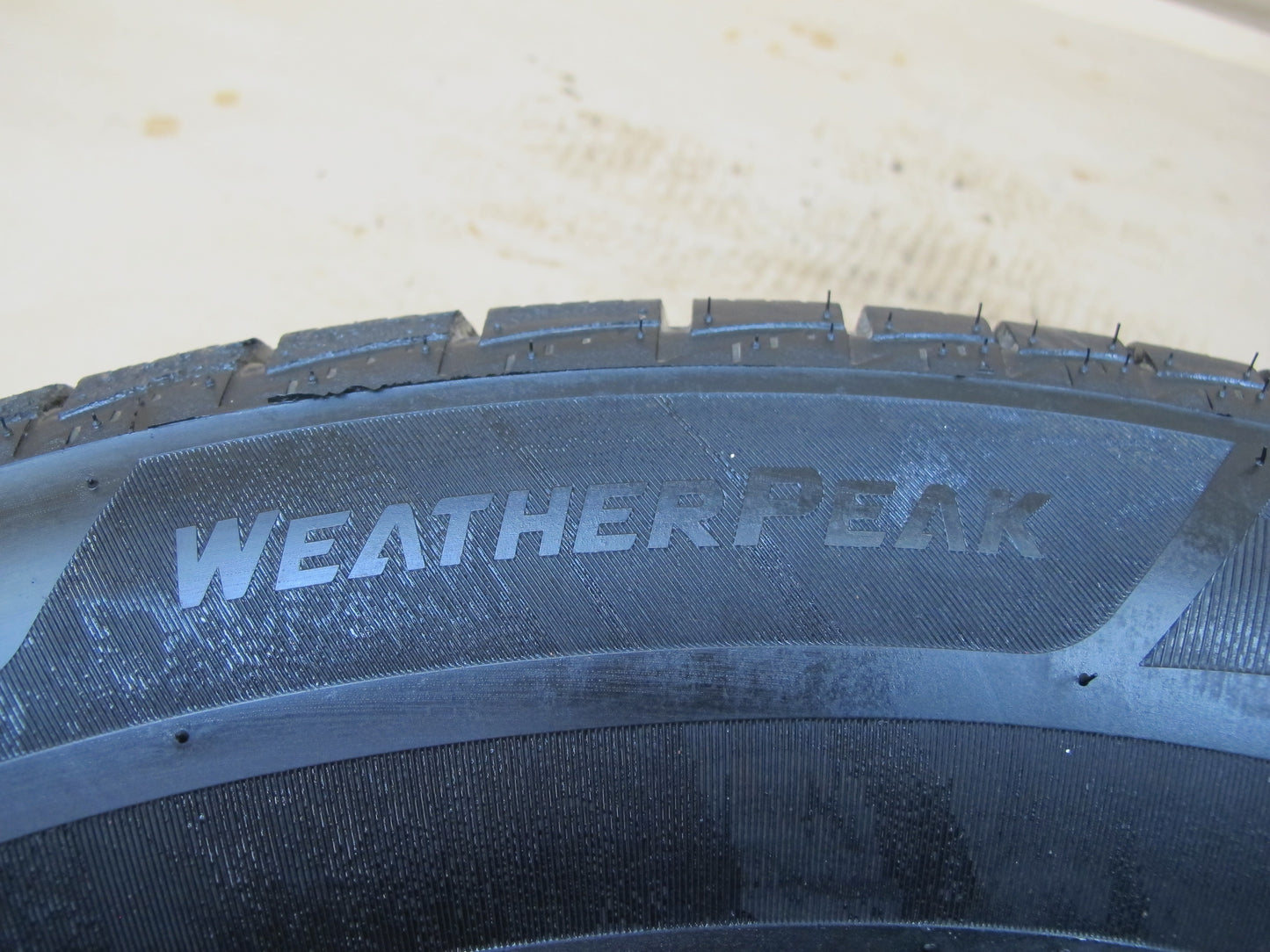 BRIDGESTONE WEATHERPEAK AS TIRE 235/65 R18 106H 2323 9/32 TREAD