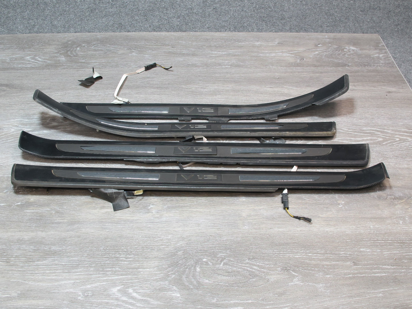 03-05 BMW E66 760Li Set of 4 Front & Rear Iluminated Door Sill Scuff Plate OEM