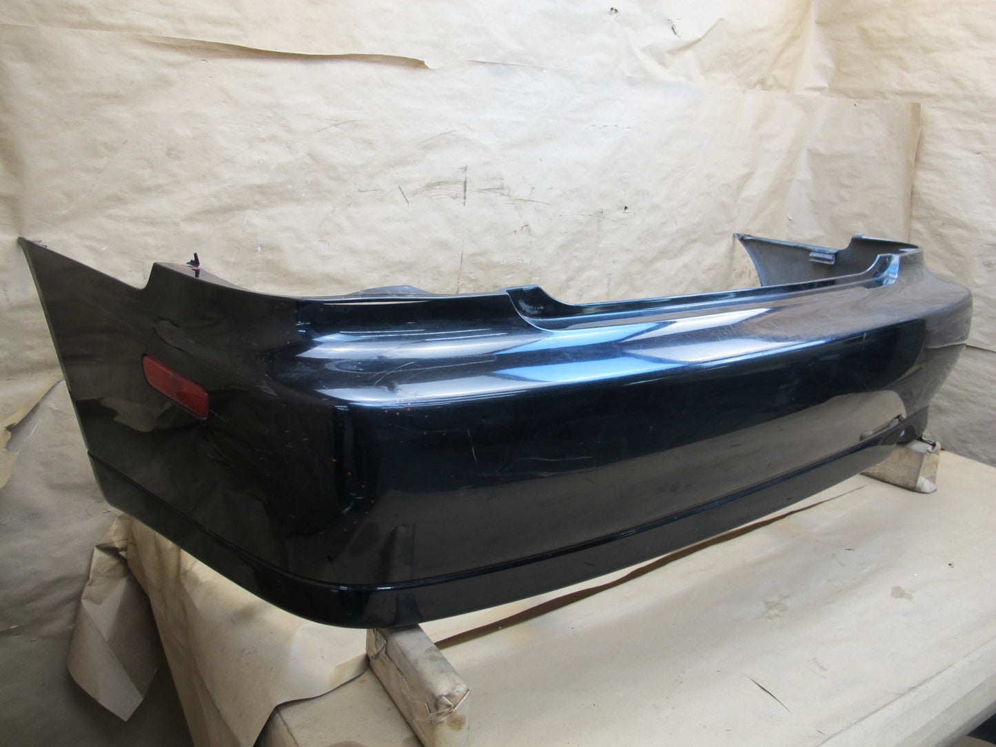 01-05 Lexus JCE10L IS300 Sedan Rear Bumper Cover w Marker Lights OEM