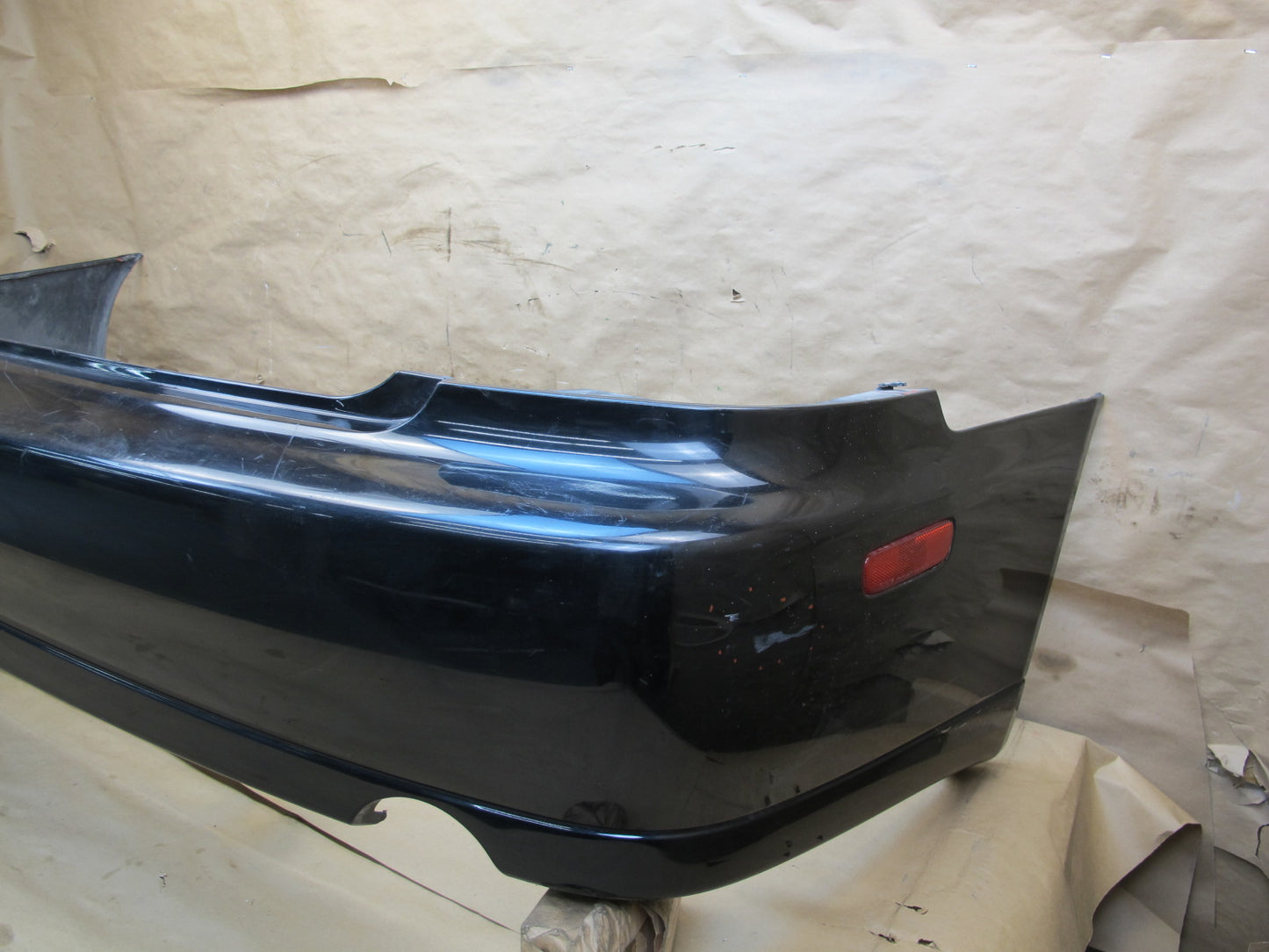 01-05 Lexus JCE10L IS300 Sedan Rear Bumper Cover w Marker Lights OEM