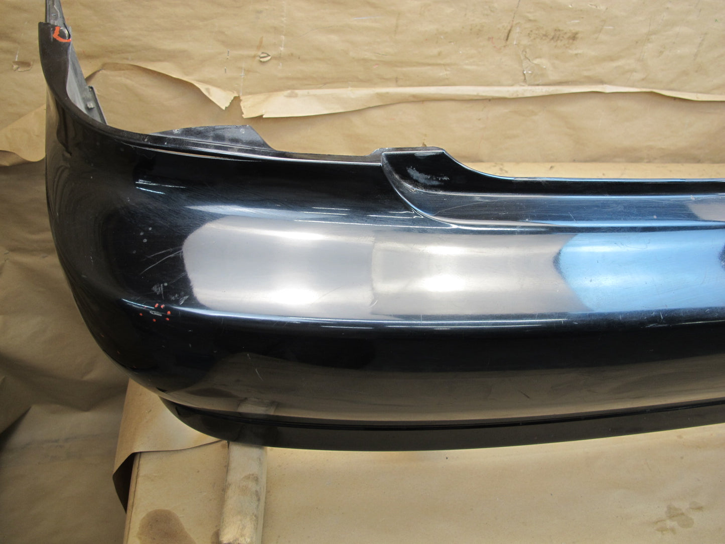 01-05 Lexus JCE10L IS300 Sedan Rear Bumper Cover w Marker Lights OEM