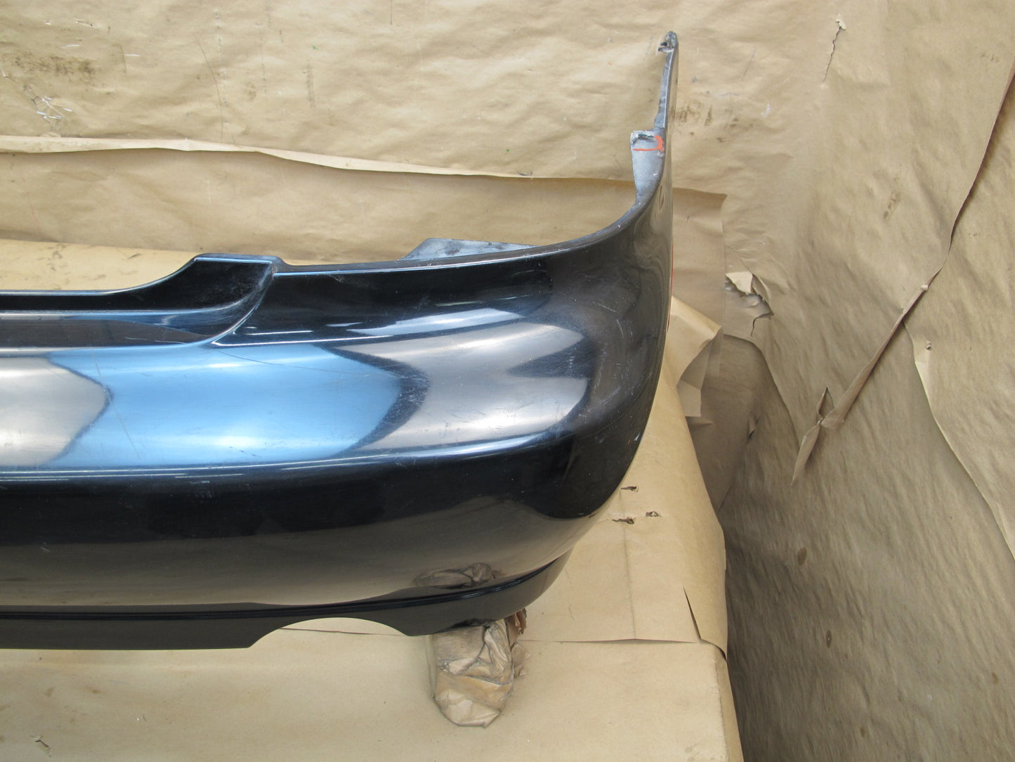 01-05 Lexus JCE10L IS300 Sedan Rear Bumper Cover w Marker Lights OEM