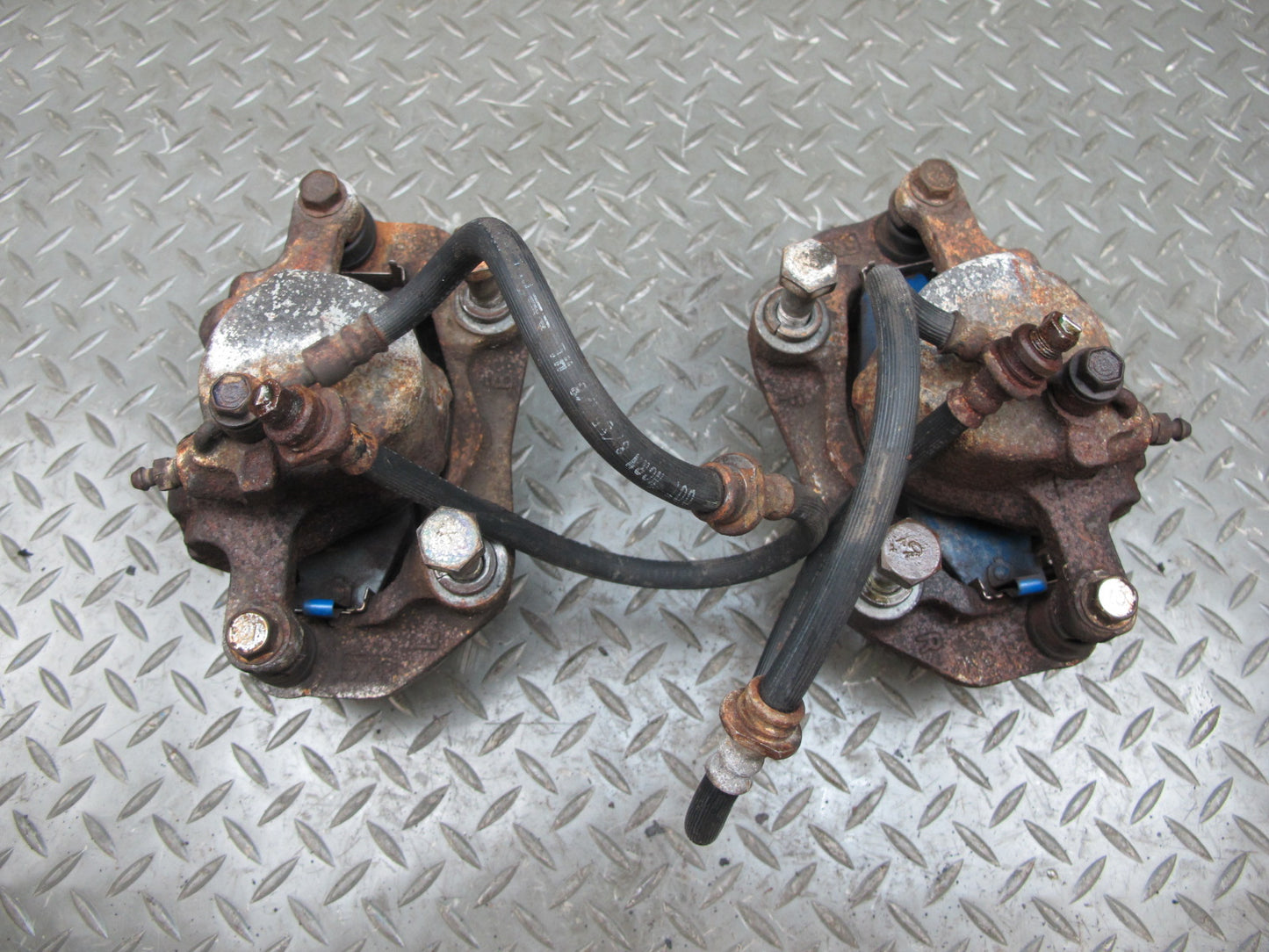 84-86 Nissan Z31 300ZX 2+0 NA Set of 2 Front Left & Right Brake Caliper OEM