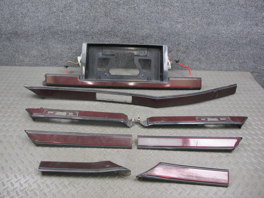 86-88 Toyota Supra MA71 Rear Bumper Molding Trim Cover License Plate Set OEM